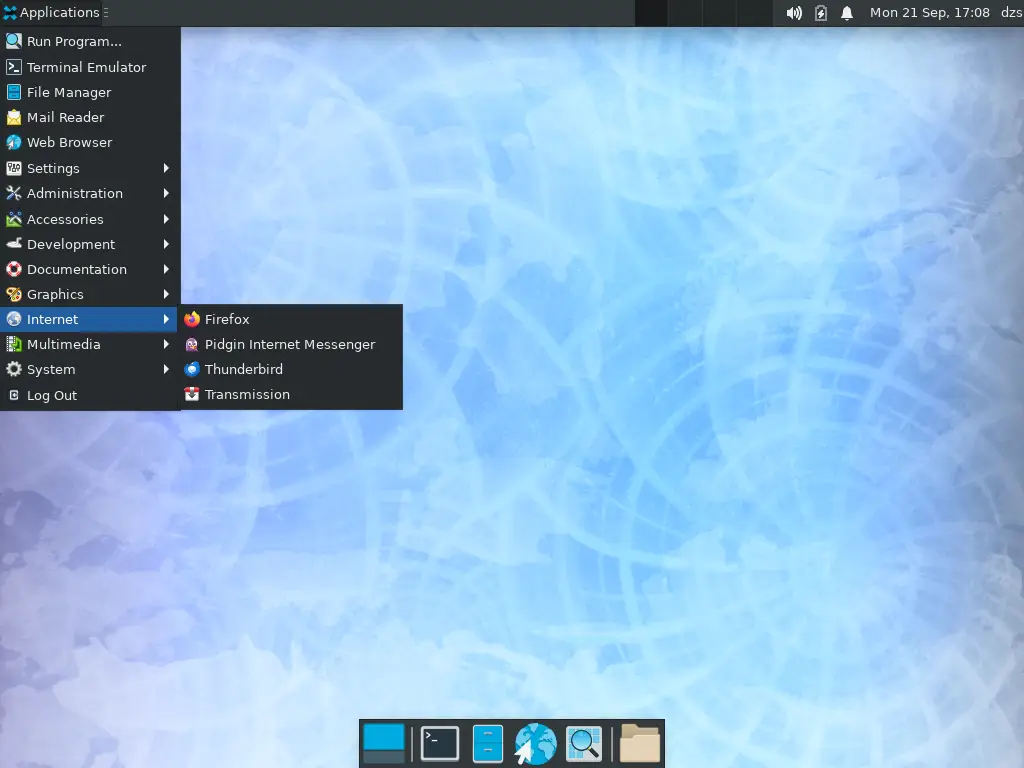 A Rocky Linux asztali felülete nyitott alkalmazásmenüvel, amely az internetes és rendszereszközöket listázza.